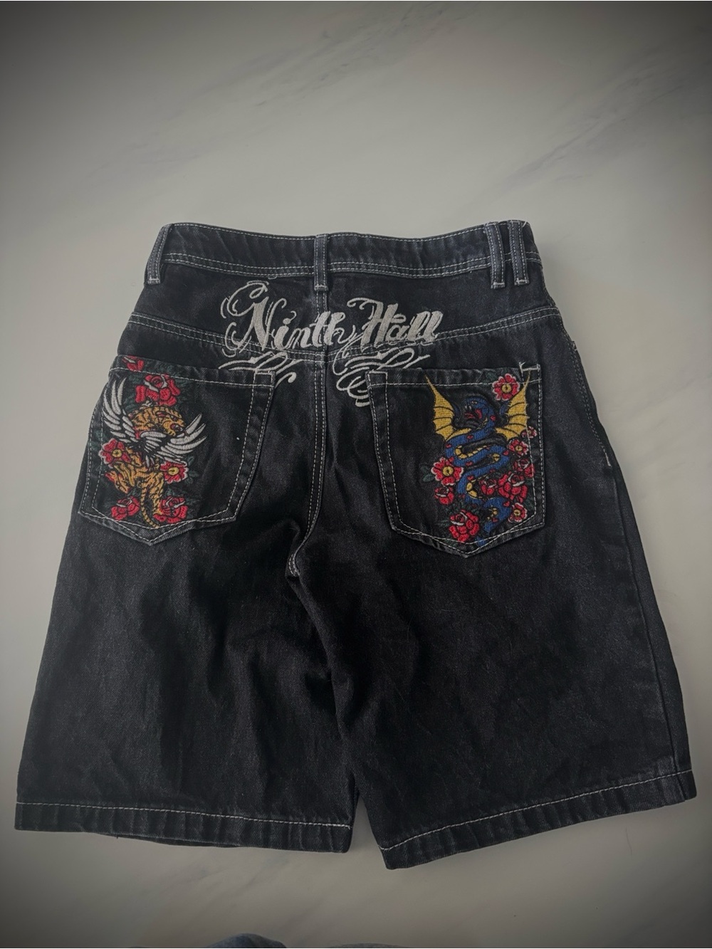Black denim NinthHall jorts lots of embroidery on front and back unisex